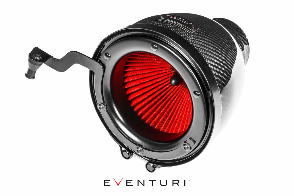 Eventuri black carbon intake system for BMW F87 M2 Competition and M2 CS with performance design and white engine bay background.
