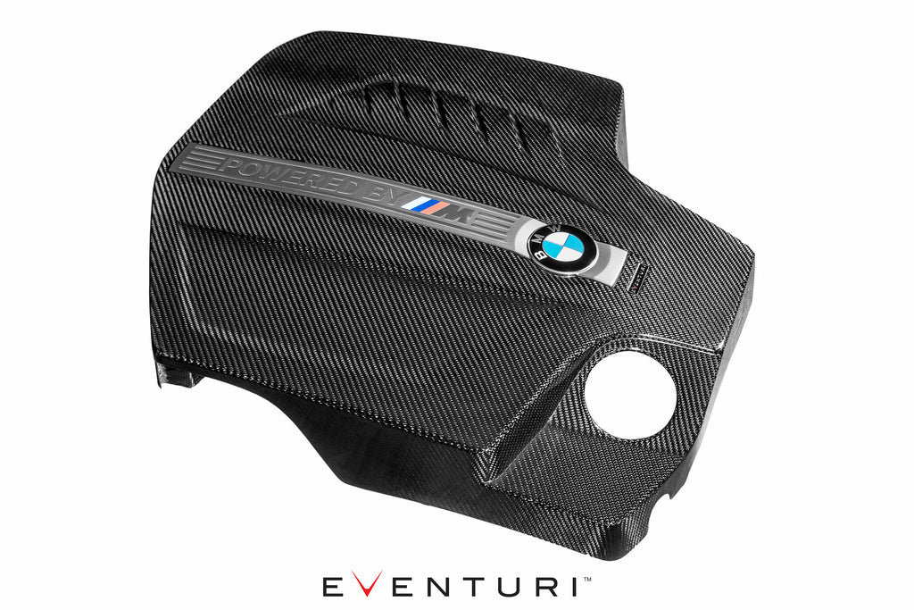 Black carbon engine cover for BMW F87 M2 N55 by Eventuri, shown from the right exterior angle.