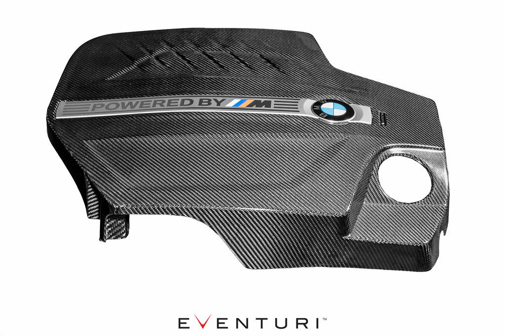 Eventuri BMW F87 M2 N55 black carbon engine cover shown from the right profile, highlighting its sleek exterior design and finish.