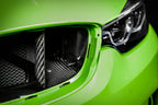 Eventuri black carbon intake system installed in engine bay of BMW F8X M3 and M4 S55 performance vehicle.