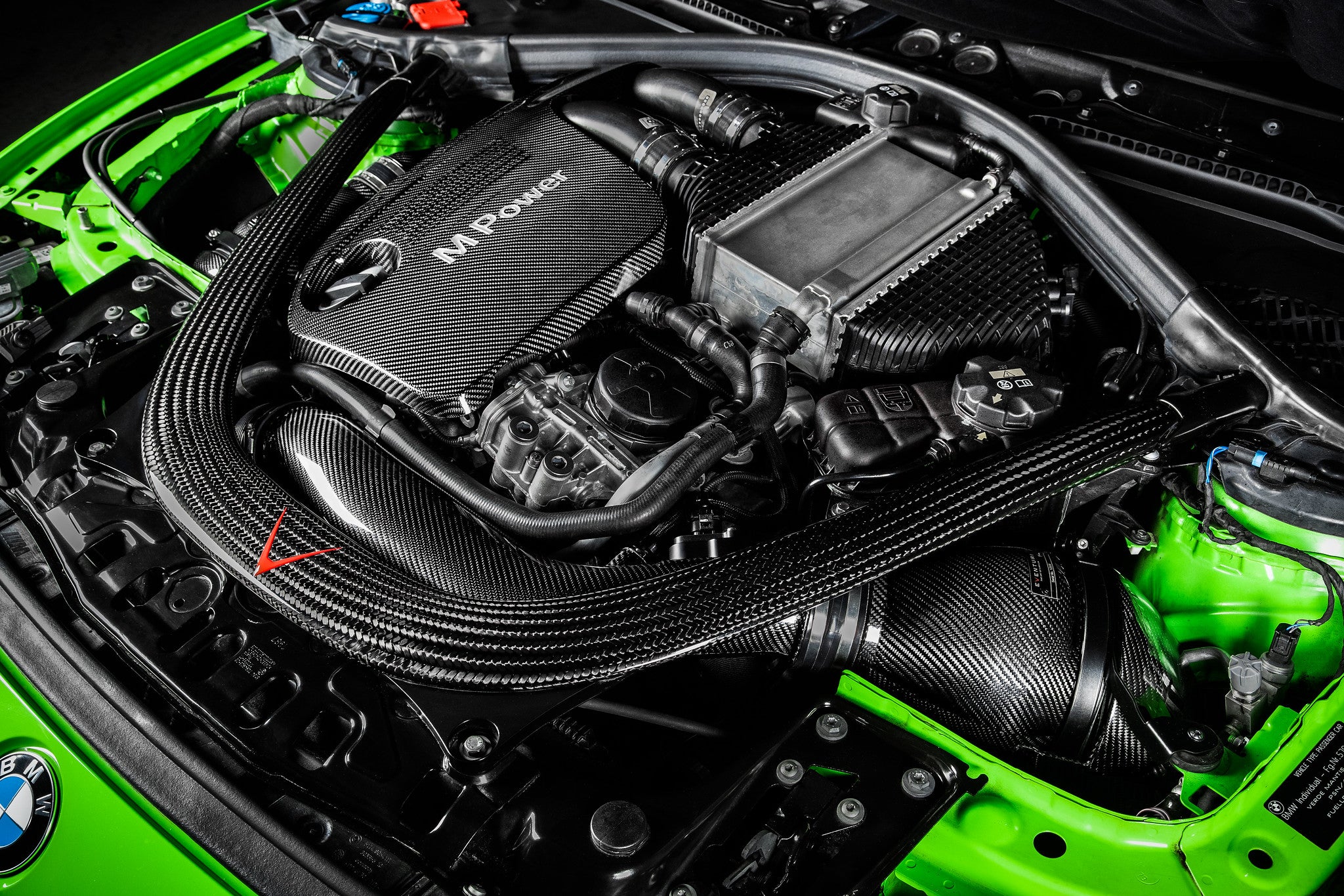 Eventuri V2 carbon intake installed on BMW F82 M4 S55 engine bay