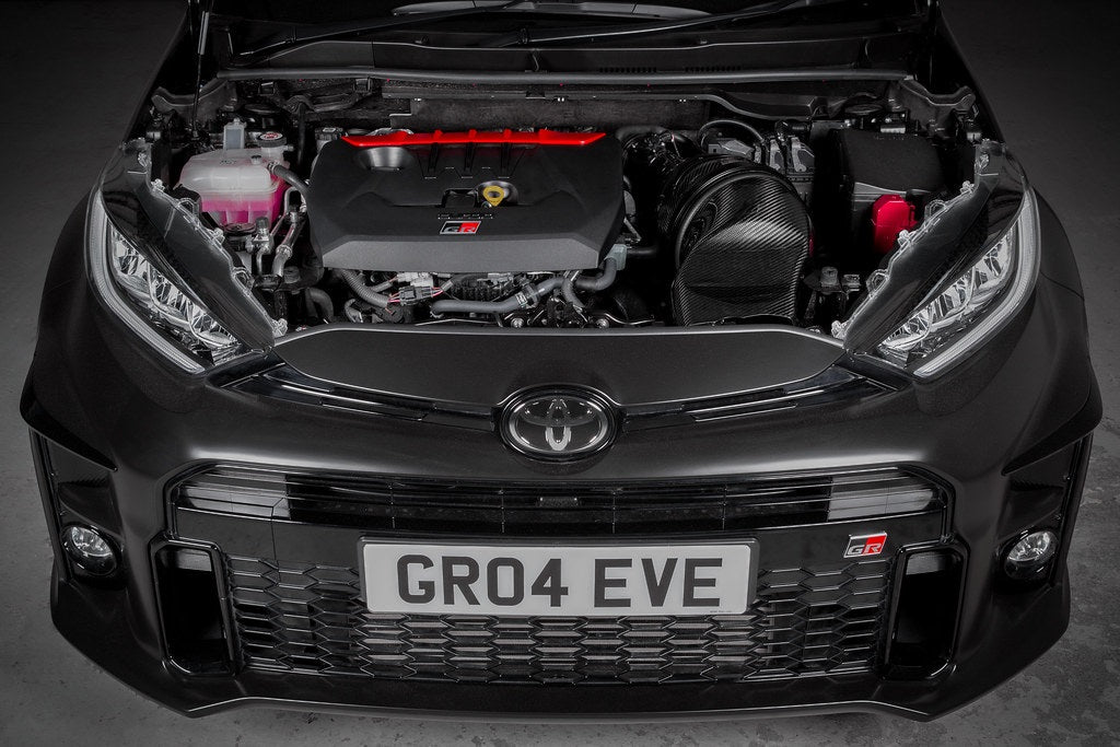 Eventuri GR Yaris carbon intake system installed, showcasing a glossy performance upgrade with sleek carbon fiber components.
