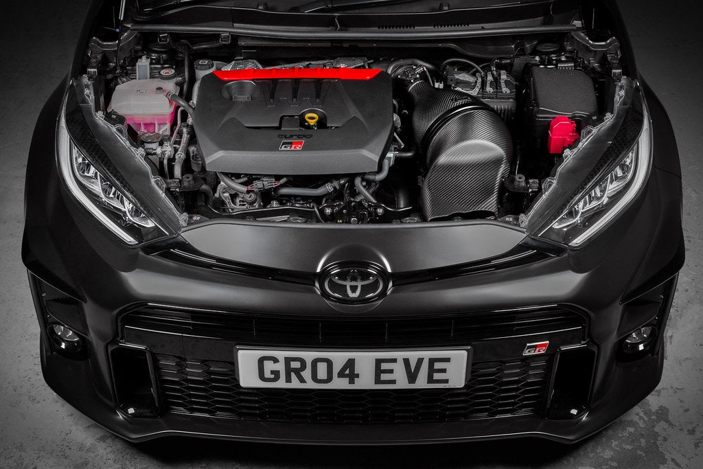 Eventuri GR Yaris carbon intake system with matte finish installed, showcasing performance air intake for enhanced engine airflow.