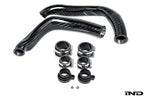 Eventuri gloss carbon charge pipe set for BMW S55 M2 Competition M3 M4 on white background