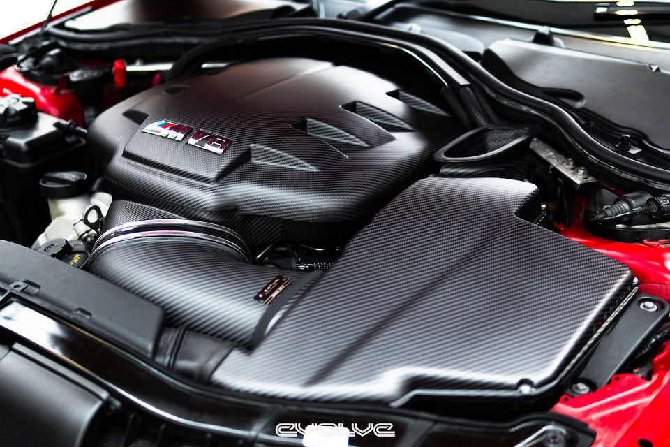 BMW S65 engine bay featuring Eventuri matte carbon fiber airbox lid