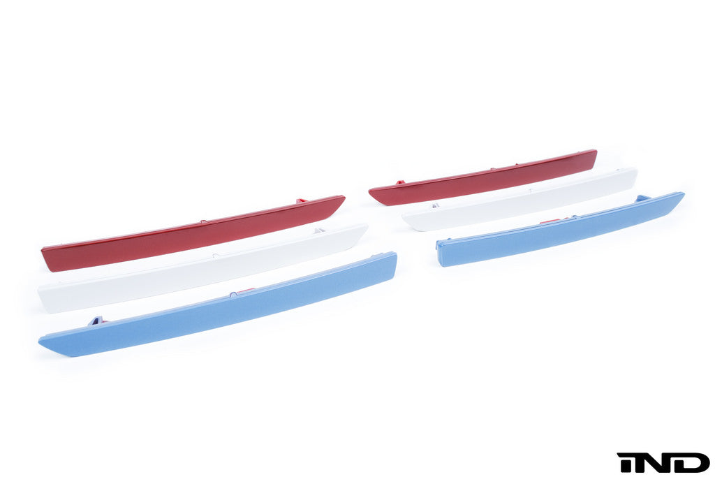 IND exterior painted rear reflector set for F8X M3 and M4 models, showing sleek, custom-colored reflectors on a car.