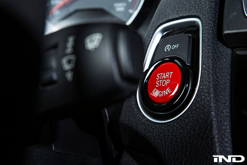 Gloss black IND F-Chassis ignition bezel for car interior, featuring a sleek, high-quality finish and precise fit.