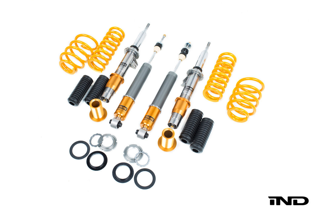 Ohlins E9X M3 coilover suspension with adjustable shocks and springs, designed for road and track performance.